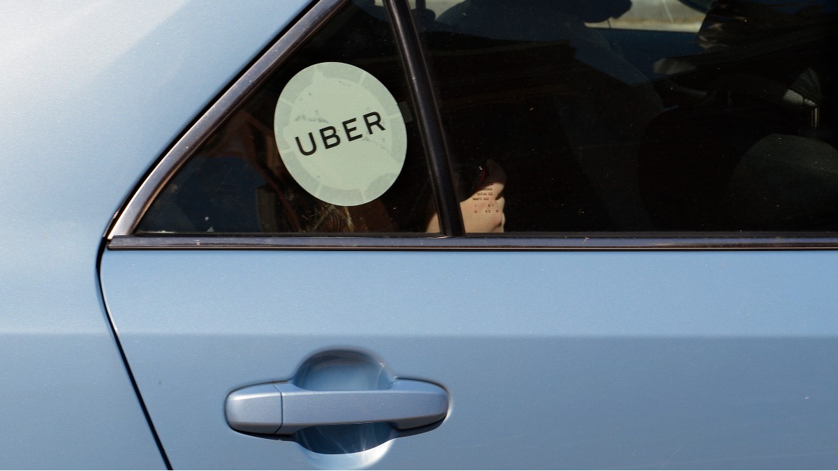 Uber driver drives off with child