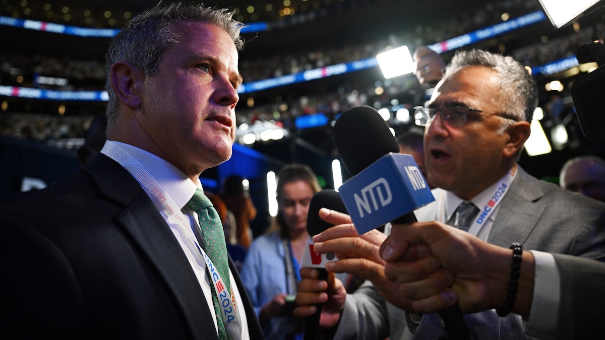 CHICAGO, ILLINOIS - AUGUST 22: Former U.S. Rep. Adam Kinzinger (R-Il) speaks to the media during the final day of the Democratic National Convention at the United Center on August 22, 2024 in Chicago, Illinois. Delegates, politicians, and Democratic Party supporters are gathering in Chicago, as current Vice President Kamala Harris is named her party's presidential nominee. The DNC takes place from August 19-22.
